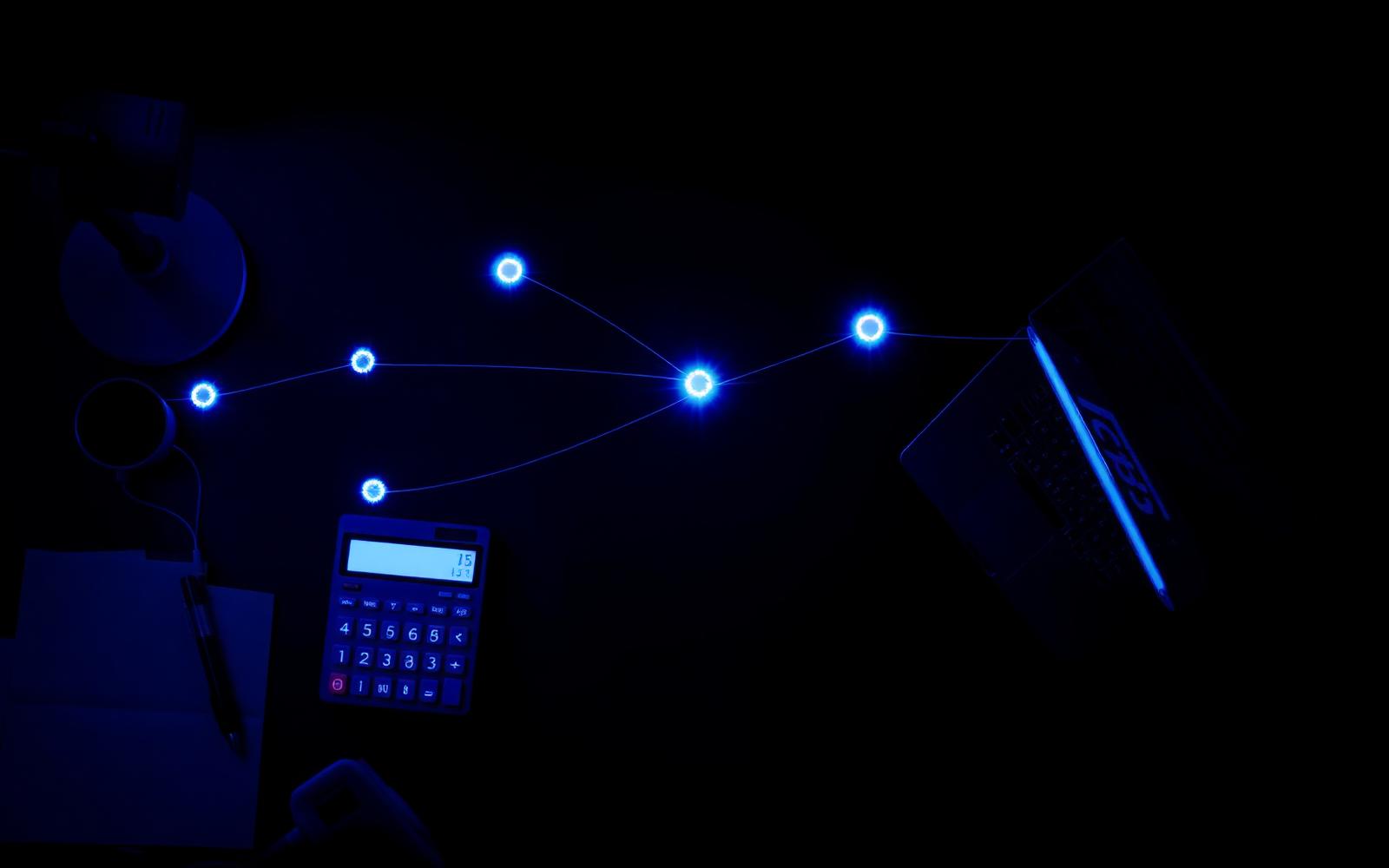 Cobalt-lit accountant's desk from above with glowing numbered dots connected in a step-by-step workflow, laptop and calculator dissolving into light