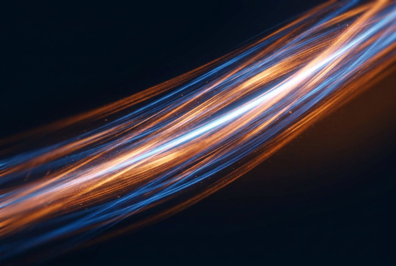 A single bright cobalt blue light streak pulling ahead of a pack of slower streaks on a near-black background